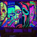UV reactive blacklight tapestry featuring a colorful trippy horror face collage glowing neon in a dark bedroom.