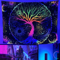 A vibrant UV-reactive tapestry of a multi-colored Tree of Life with a glowing moon and cosmic patterns, illuminated under a purple blacklight in a dark room.