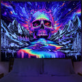 UV reactive blacklight tapestry showing a large rainbow-colored skull over a neon mountain range and starry galaxy.